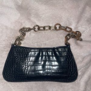 A new day black purse